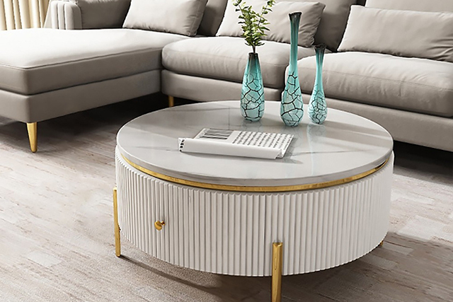 Kết hợp bàn tròn với sofa chữ L cũng là một sự kết hợp rất ăn ý, tạo nên sự hài hòa trong không gian nội thất