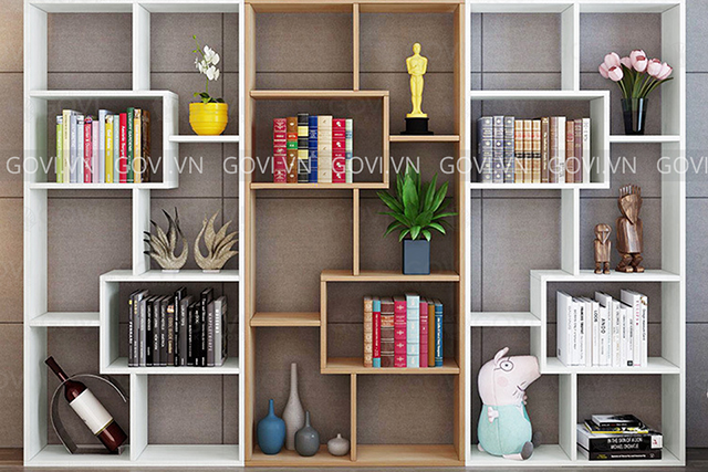 Sử dụng tủ sách gỗ vừa tăng thêm sự sang trọng cho căn phòng, vừa có tác dụng trưng bày sách và có thể cách tạp âm giúp không gian yên tĩnh, thoải mái hơn